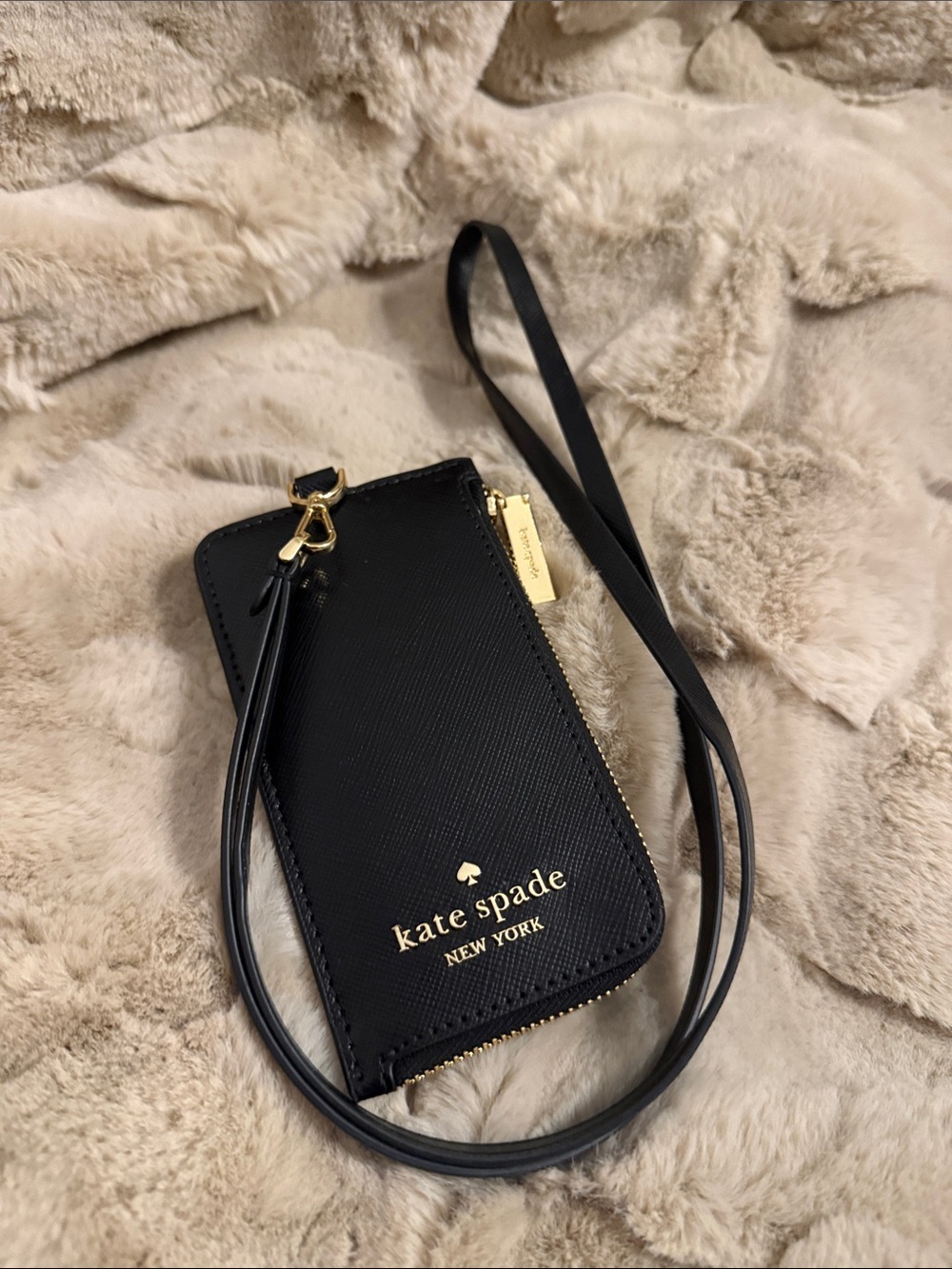 kate spade black leather wristlet card case with gold logo